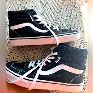 Slightly worn high top vans. women’s size 9.